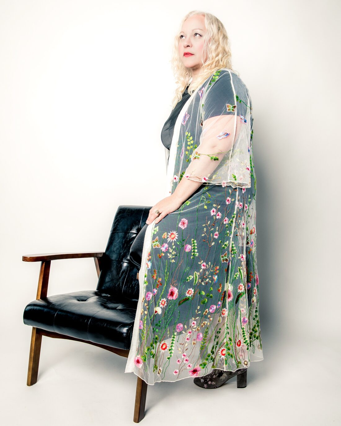 Katie Ditschun in an embroidered floral dress, from the There Will Be Flowers session